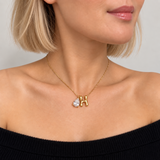 Sculptural Initial Pear Crystal Necklace – Gold Letter H Charm with Pear-Cut Crystal, Styled on Model