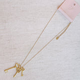 Gold key charm necklace – delicate vintage style