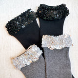 Sparkly socks featuring a sequin-embellished top band, adding a touch of chic shine and glam to any outfit.