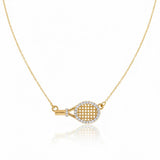 Chic and sporty necklace featuring a sideways-hanging tennis racket charm on a sleek chain. A playful accessory for tennis lovers, blending athletic flair with everyday style.