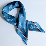 Elegant satin square scarf with a smooth, glossy finish—perfect for versatile styling as a hair accessory, neck tie, or bag accent.