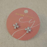 Silver-tone stud earrings in a floral clover shape, each featuring four pear-shaped cubic zirconia stones arranged in a symmetrical pattern for a radiant and delicate sparkle.