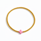 Beaded gold bracelet featuring a small polished cross charm centered. The So Very Blessed Cross Bracelet offers a meaningful, minimalist design perfect for everyday wear or gifting.