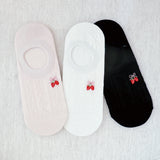 Set of three low cut socks featuring playful strawberry-themed patterns in soft pastel tones, designed for comfort and everyday charm.