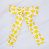 Colorful hair clip featuring a playful fruit print with lemons, strawberries, and cherries—adding a fun, fresh pop to any hairstyle.