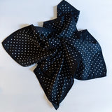 Lightweight textured square scarf with a soft finish, ideal for accessorizing hair, necklines, or handbags with effortless elegance.