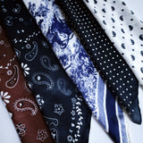 Lightweight textured square scarf with a soft finish, ideal for accessorizing hair, necklines, or handbags with effortless elegance.