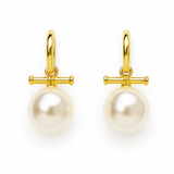 Sleek gold-tone toggle bar earrings featuring a lustrous pearl drop, blending modern structure with timeless charm for a refined, fashion-forward statement.