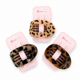 Three tortoiseshell hair clips on pink cards with 'Elle & Nala' branding on a white background.
