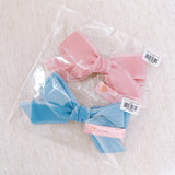 Triple Bowed Pretty Edges Hair Clip in packaing