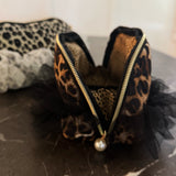 Soft lace travel bag with snow leopard print design, perfect for makeup, toiletries, or small essentials