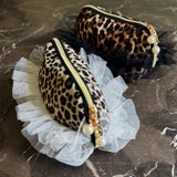 Soft lace travel bag with snow leopard print design, perfect for makeup, toiletries, or small essentials