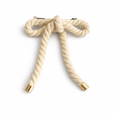 Rope-style hair clip in a sculptural bow shape, featuring a textured twisted design that adds playful elegance and volume to any hairstyle.
