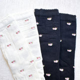 Charming set of two socks featuring delicate vintage-inspired floral patterns—perfect for adding a touch of timeless elegance to your everyday look.