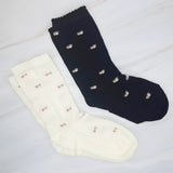 Charming set of two socks featuring delicate vintage-inspired floral patterns—perfect for adding a touch of timeless elegance to your everyday look.