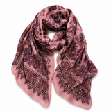A pink paisley bandana scarf with dark red and navy blue patterns, draped on a clean white background.