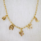 Cowgirl charm necklace with hat, boots, and horse – western fashion vibe