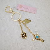 Keychain with cow skull, cactus, hat and turquoise charm – western style