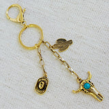 Keychain with cow skull, cactus, hat and turquoise charm – western style