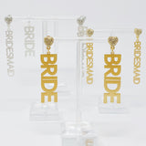 Soyez mes boucles d’oreilles de demoiselle d’honneur