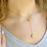 Collar con gota de brillo superior