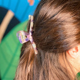 Garra de pelo apenas visible