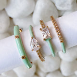 Juego de 4 anillos con glamour pastel