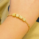 Pulsera con dijes de rodar los dados