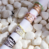 Juego de 4 anillos con glamour pastel