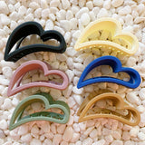 Juego de garras para el cabello en nombre de tu corazón