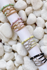 Juego de 4 anillos con glamour pastel