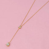 Collar con gota de brillo superior