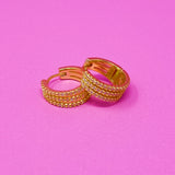 Boucles d'oreilles Huggie triple brillance