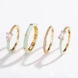 Juego de 4 anillos con glamour pastel