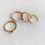 Juego de 4 anillos con glamour pastel