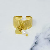 Anillo colgante de puño