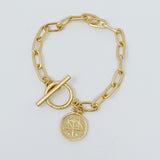 Pulsera de cadena con dijes del zodíaco