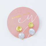 Boucles d'oreilles pendantes en perles de coquillage dorées