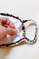 Máscara de tela de bebé leopardo