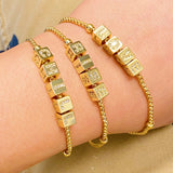 Pulsera con dijes de rodar los dados