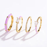 Juego de 4 anillos con glamour pastel