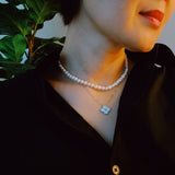 Collier de perles véritables avec fermoir trèfle