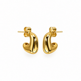 Angled close-up of the 18K gold-plated Cove Hoop Earrings showing their smooth, sculptural curved shape