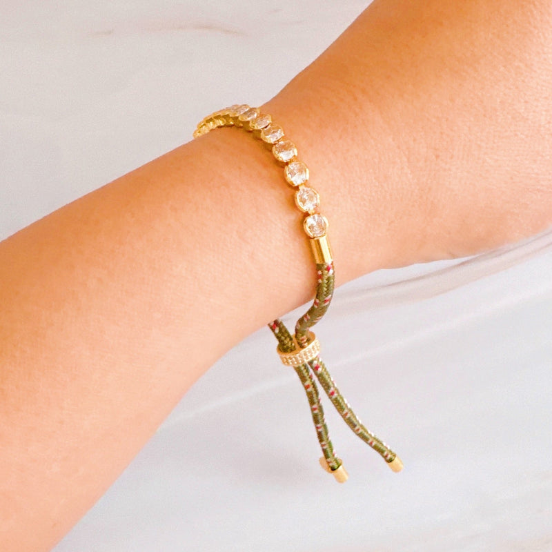 Adjustable rope-style tennis bracelet featuring round bezel-set cubic zirconia stones, offering a modern blend of shimmer and sporty sophistication.