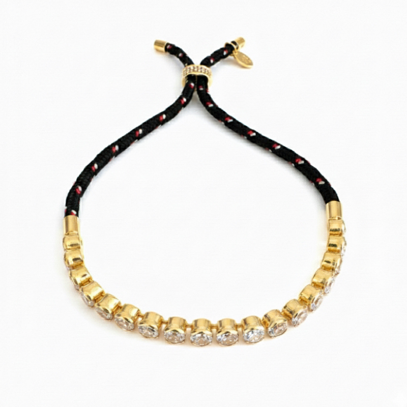 Adjustable rope-style tennis bracelet featuring round bezel-set cubic zirconia stones, offering a modern blend of shimmer and sporty sophistication.