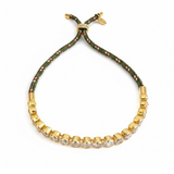 Adjustable rope-style tennis bracelet featuring round bezel-set cubic zirconia stones, offering a modern blend of shimmer and sporty sophistication.