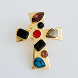 Elegant cross-shaped brooch pin with an artisan-inspired design, featuring sculpted edges and a smooth metallic finish available in gold or silver tones, perfect for adding a refined accent to jackets, scarves, or bags.