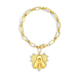 Gold bracelet with a heart-shaped charm featuring the letter 'A' on a white background