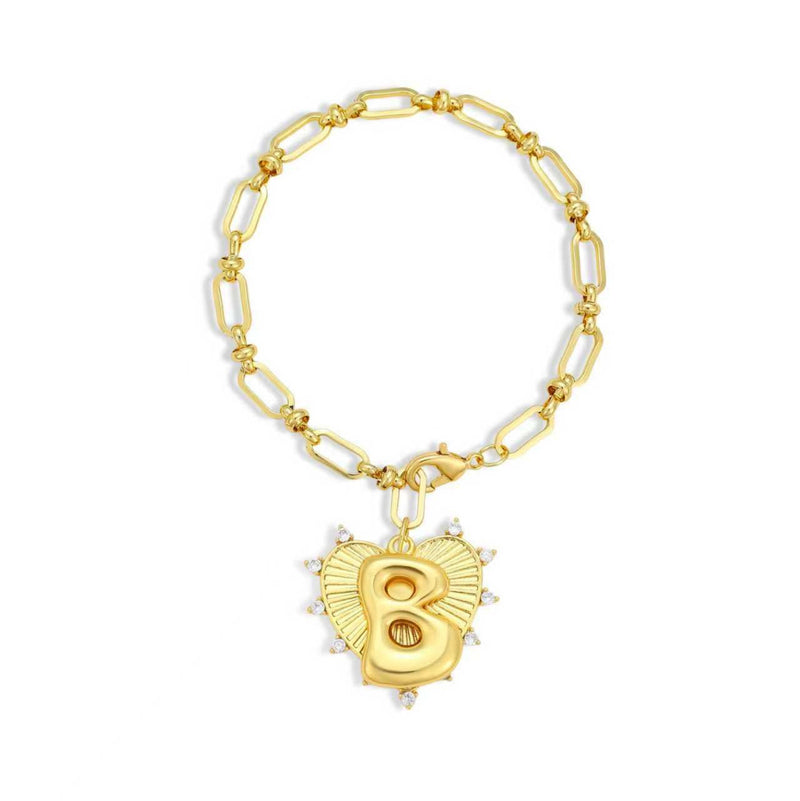 Gold bracelet with a heart-shaped charm featuring the letter 'B' on a white background