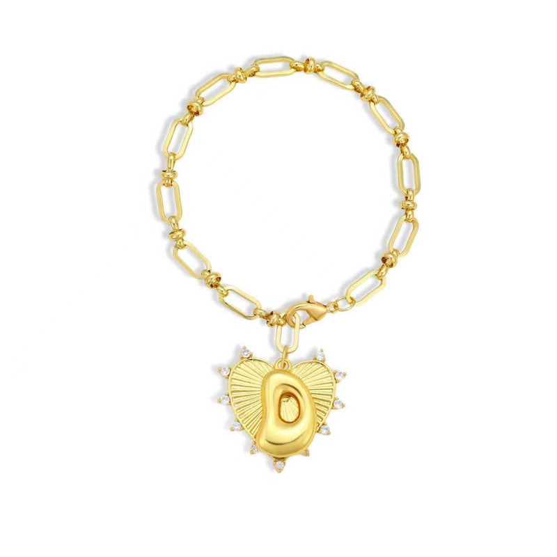 Gold bracelet with a heart-shaped charm on a white background